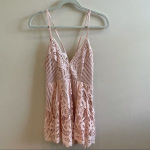 Beautiful peachy/pink lace romper.